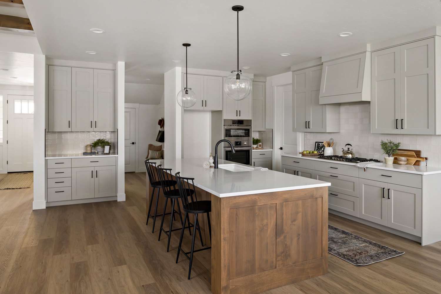 White kitchen with gold hardware and modern farmhouse style in Boise Idaho new home