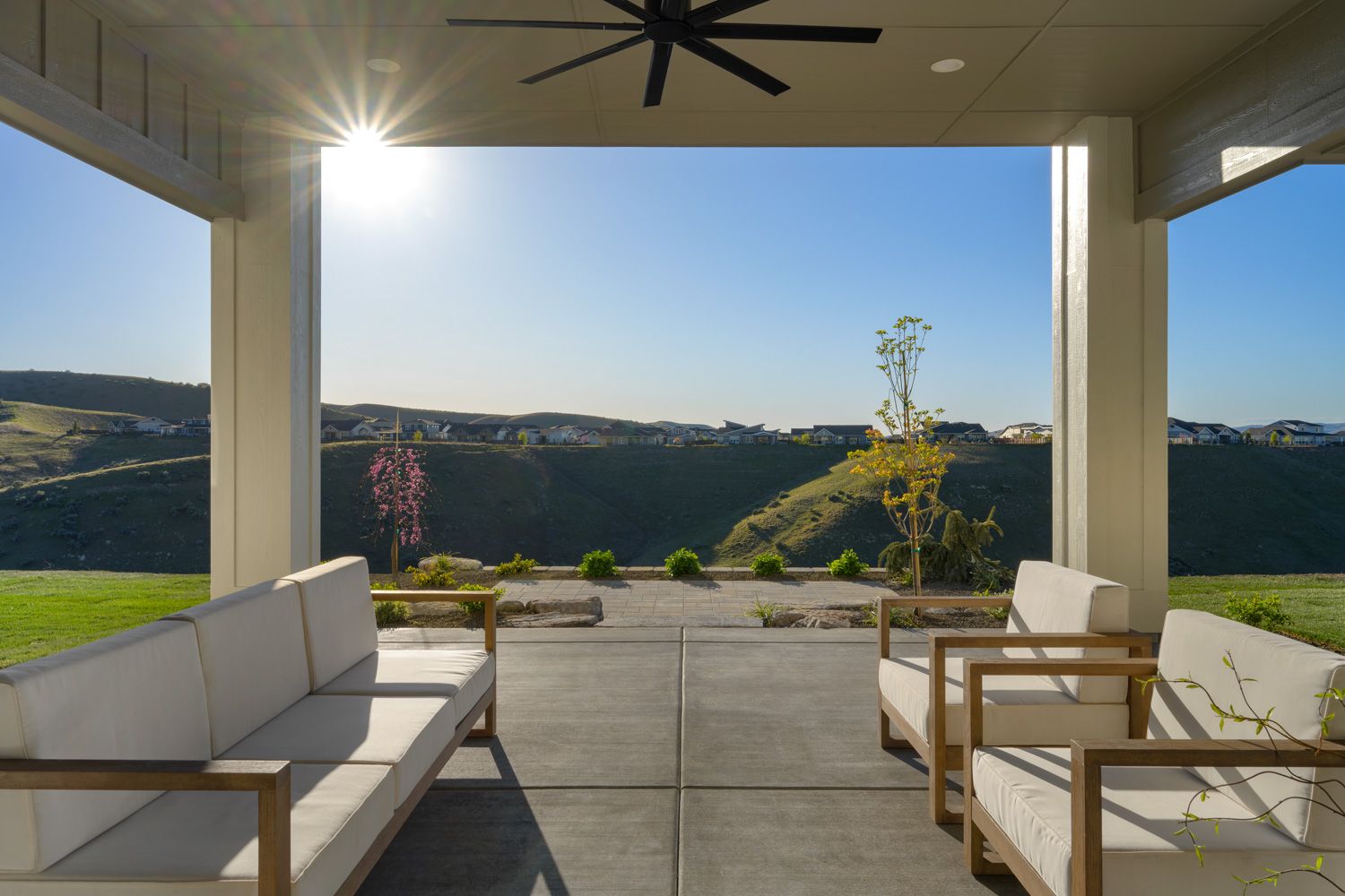 Outdoor dining patio with scenic Boise Idaho foothills view at golden hour