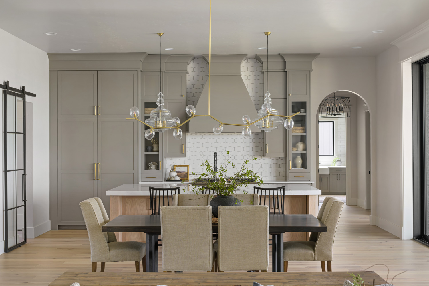 Modern living room with black steel frame windows and high ceilings in Boise Idaho