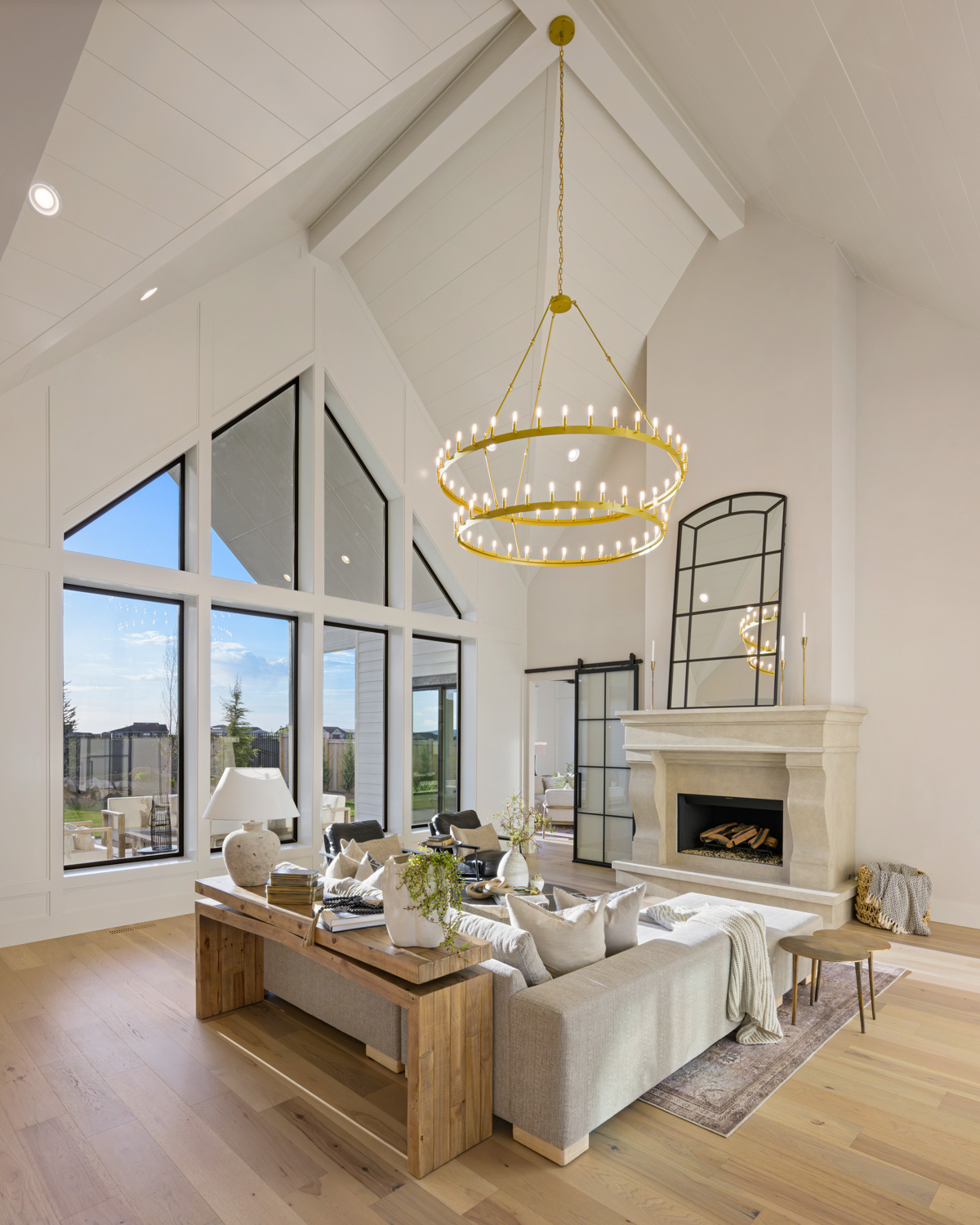 Ornate gold chandelier detail in elegant dining room of Boise Idaho luxury home