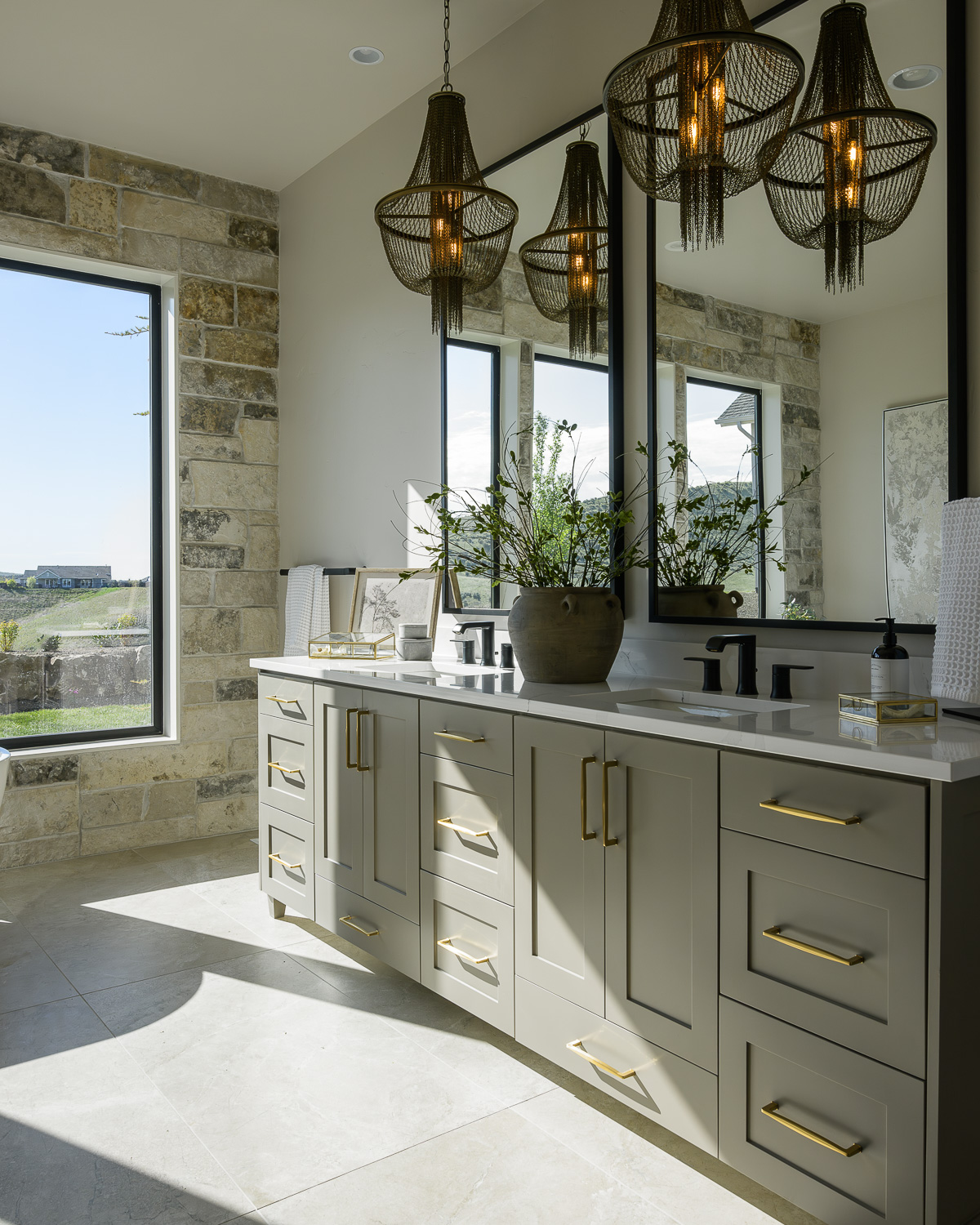Modern open-concept living space with vaulted ceilings at night in Boise Idaho