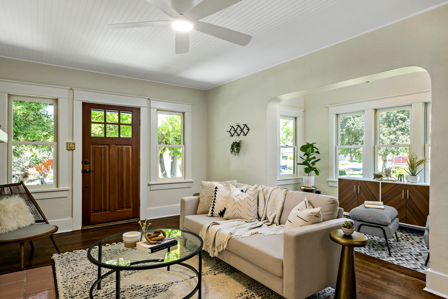 Hardwood floor entryway and living room of charming Boise Idaho home
