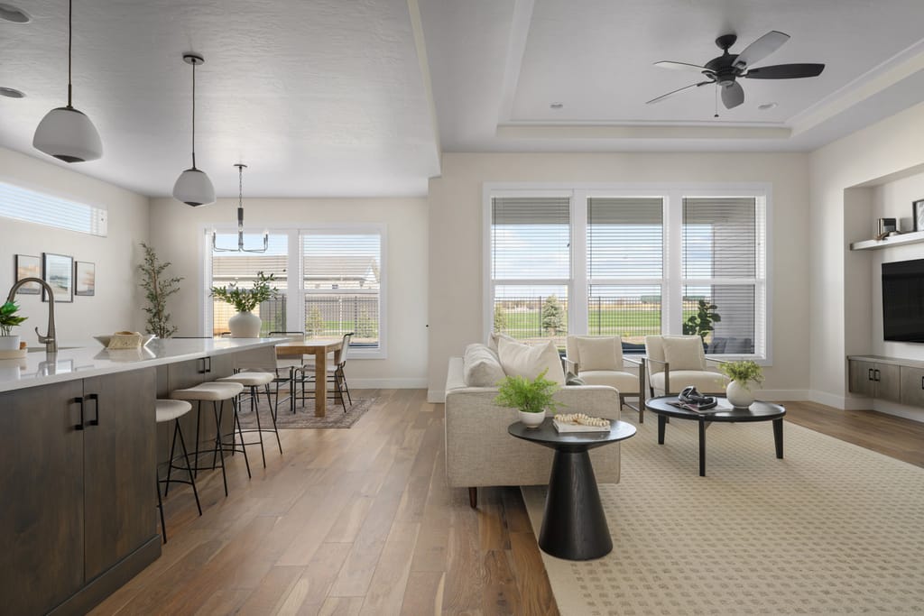 Bright open concept living room with large windows and modern furniture in Boise Idaho