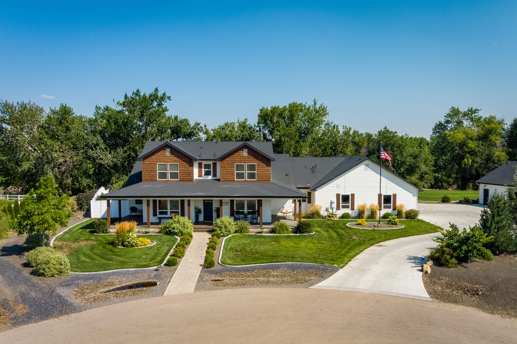 Aerial sunset drone photo of luxury homes in Boise Idaho foothills