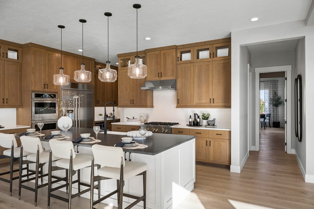 Modern farmhouse with wood siding and landscaped yard in Boise Idaho