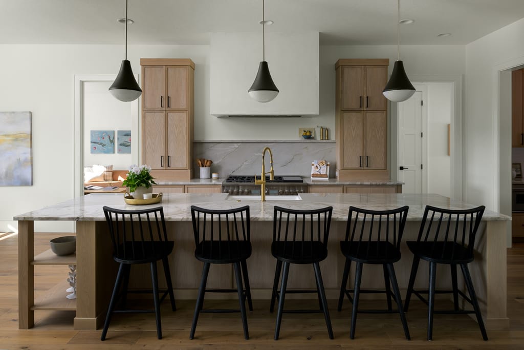Covered outdoor patio with fireplace and evening sky view in Eagle Idaho