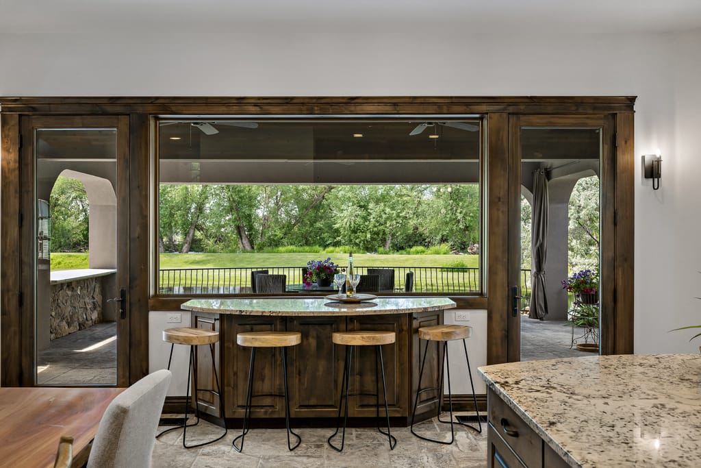 Wrought iron balcony railing with mountain view at Boise Idaho luxury home